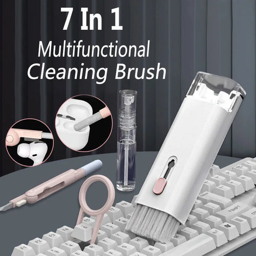 7-in-1 multifunctional cleaning brush with various uses on a keyboard.