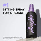 Black setting spray bottle with purple spray nozzle and 'allnighter' text on a light gray background. Emiravaly