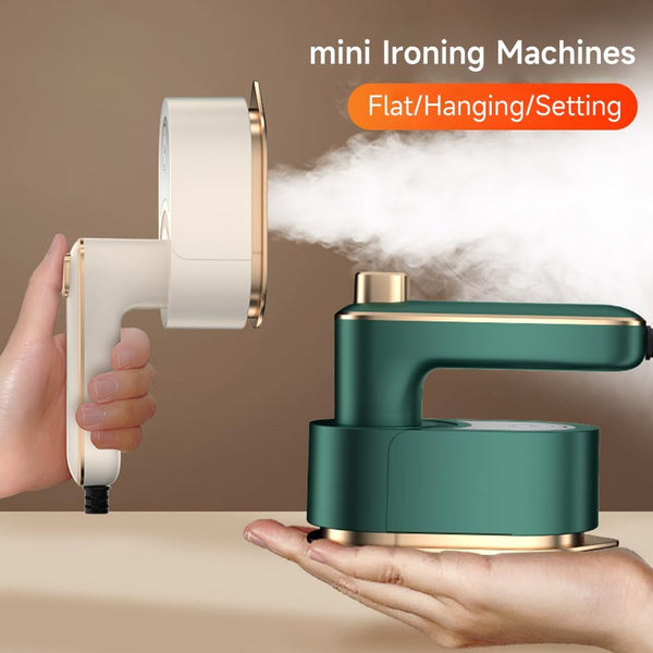 Foldable Travel Iron emitting steam held in hand — Emiravaly UAE
