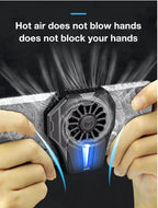 Handheld device with fan blowing hot air, held by two hands against a dark background. Emiravaly
