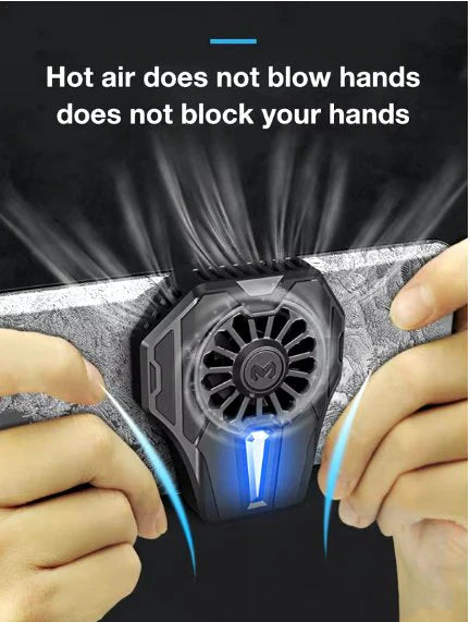 Handheld device with fan blowing hot air, held by two hands against a dark background. Emiravaly