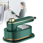 Woman using Foldable Mini Travel Iron on fabric — compact steam iron by Emiravaly
